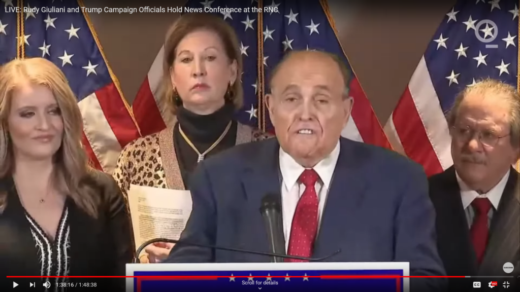 Image captured from the bizarre Nov. 19, 2020 press conference where the Trump legal dream team told us about Venezuelan voting machines.