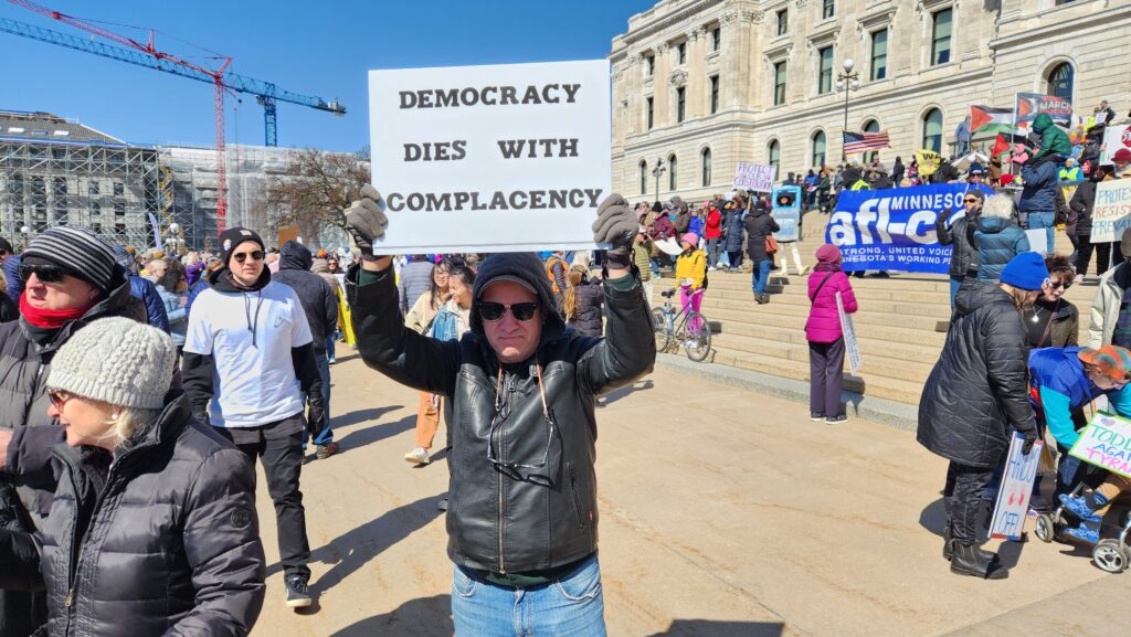 Picture of a sign from the April 5, 2025 Hands Off protest rally at the state capitol in St. Paul, Minnesota.