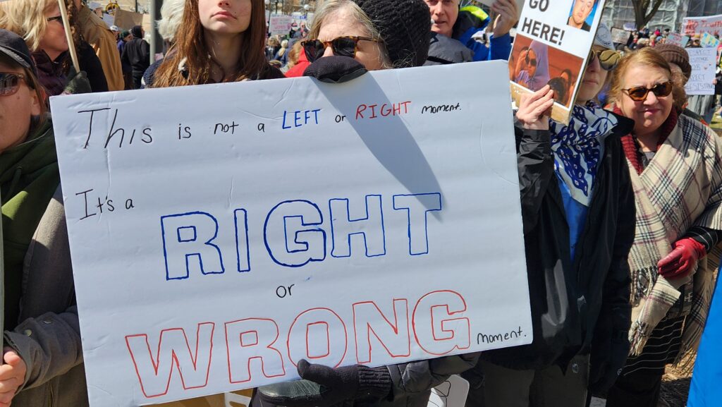 This sign from the April 5, 2025 Hands Off state capitol rally in St. Paul, Minnesota, will help win me over.