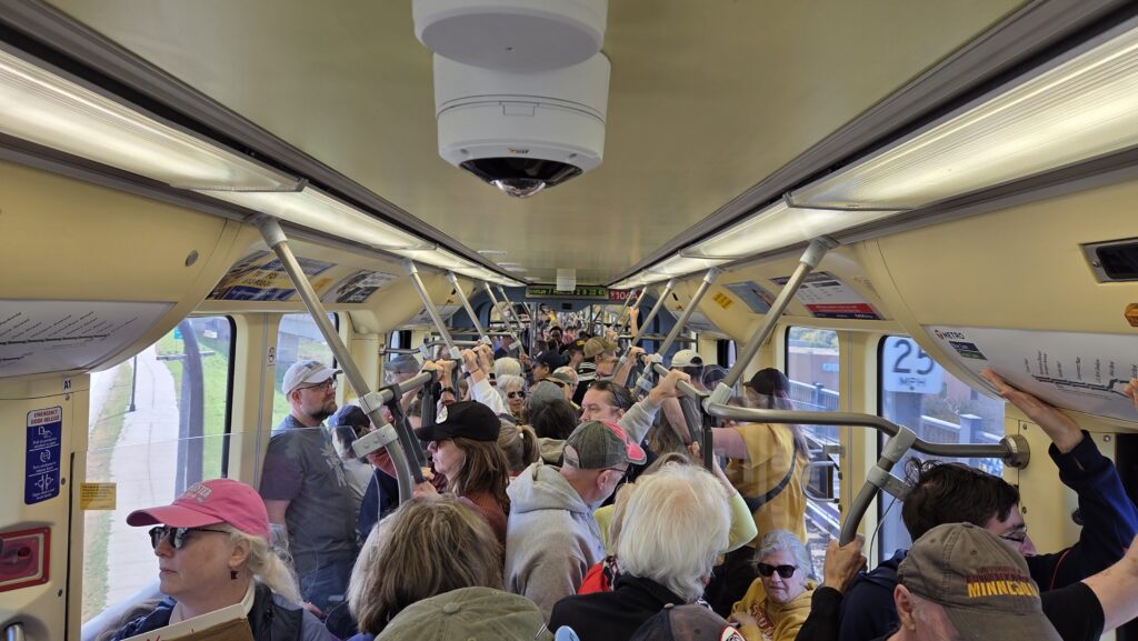 Light rail train cram-packed full on the way to the Minneapolis No Kings rally.
